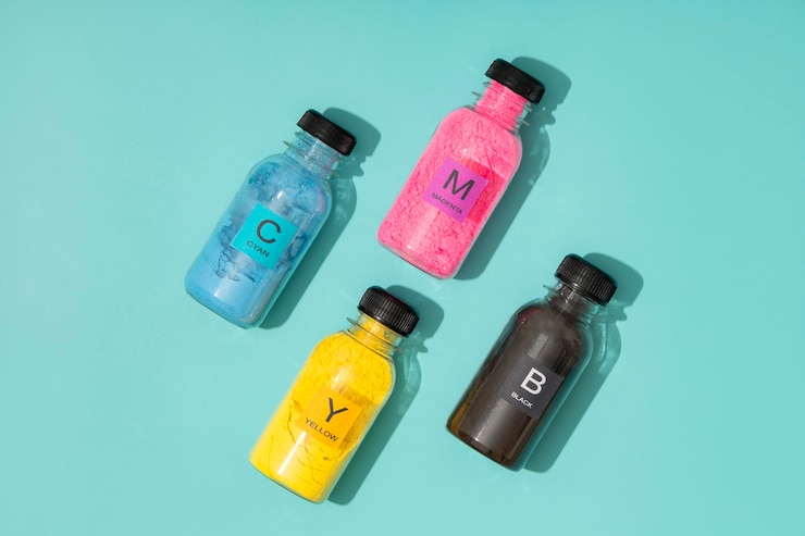 Foto gratuito arreglo de tóners cmyk de naturaleza muerta