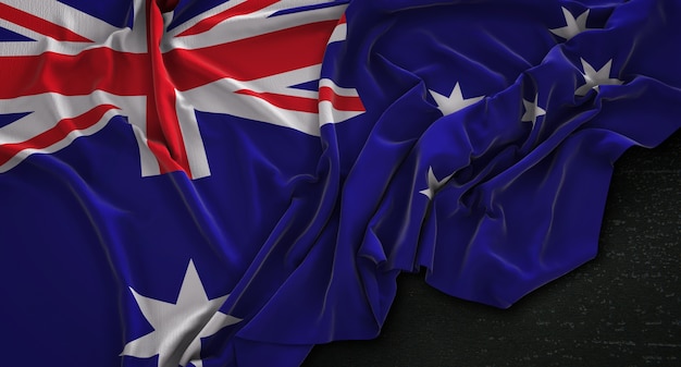 Bandera de Australia arrugado sobre fondo oscuro 3D Render