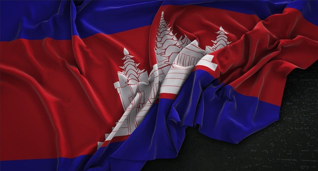 Foto gratuita bandera de camboya arrugado sobre fondo oscuro 3d render