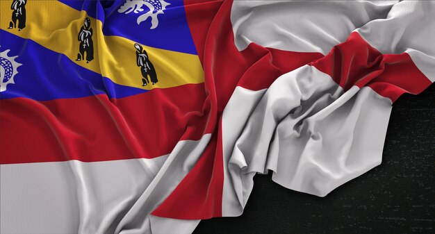 Bandera de Herm arrugado sobre fondo oscuro 3D Render