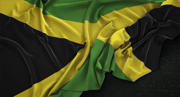 Bandera de Jamaica arrugado sobre fondo oscuro 3D Render