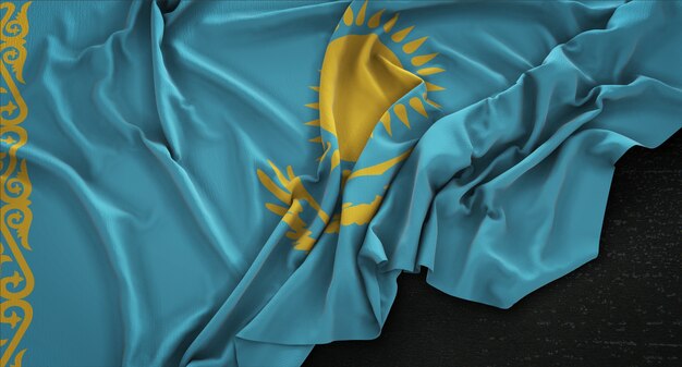 Bandera de Kazajstán arrugado sobre fondo oscuro 3D Render