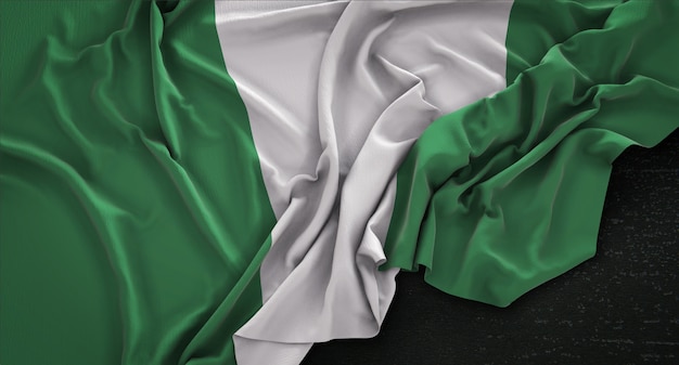 Bandera de Nigeria arrugado sobre fondo oscuro 3D Render