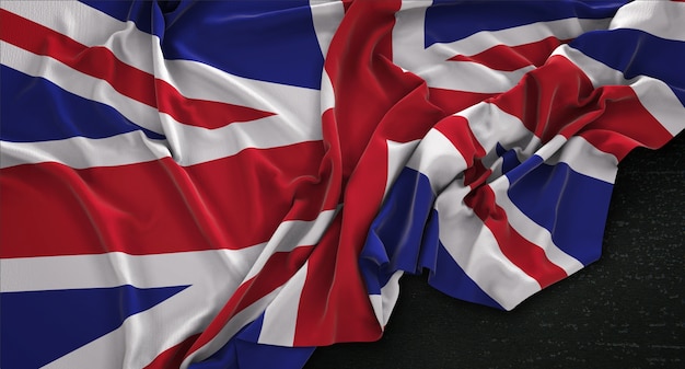 Bandera de Reino Unido Arrugado sobre fondo oscuro 3D Render