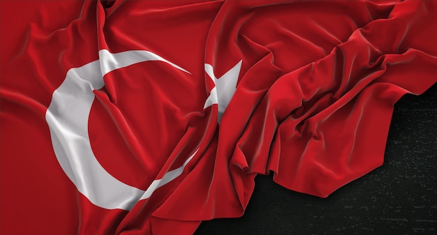 Bandera de Turquía arrugado sobre fondo oscuro 3D Render