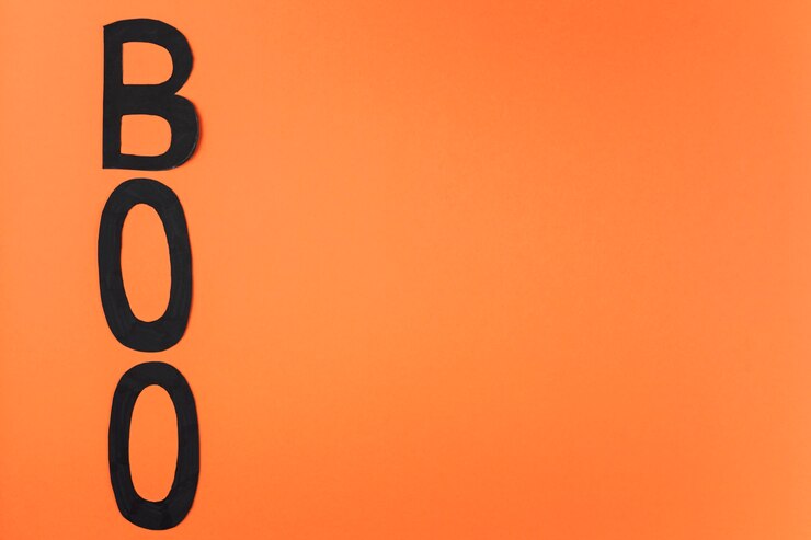 Foto gratuito boo letras cortadas de papel