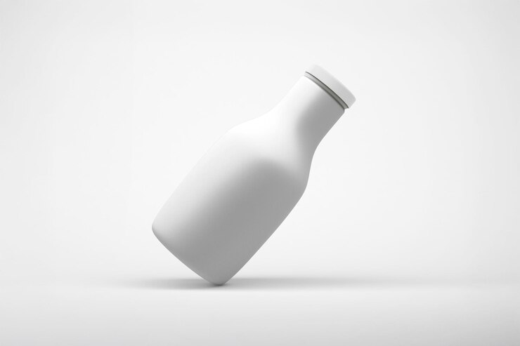 Foto gratuito botella de leche blanca
