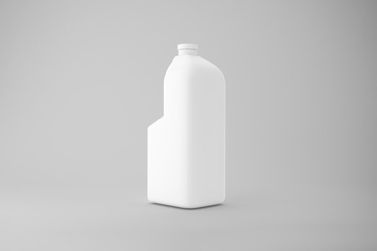 Foto gratuito botella de plástico blanca sobre un fondo gris