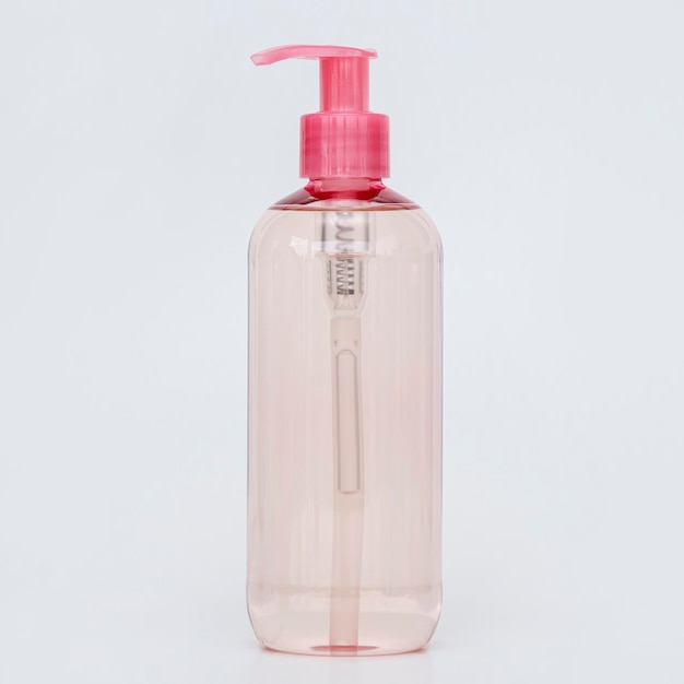 Botella rosa de jabón líquido