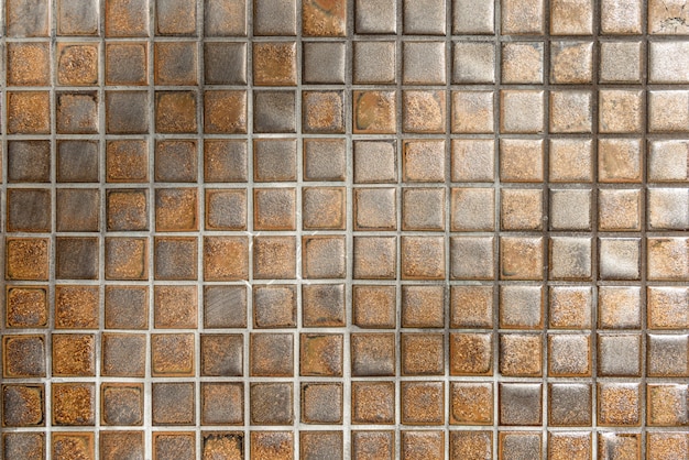 Foto gratuita brown mosaico de fondo de la pared