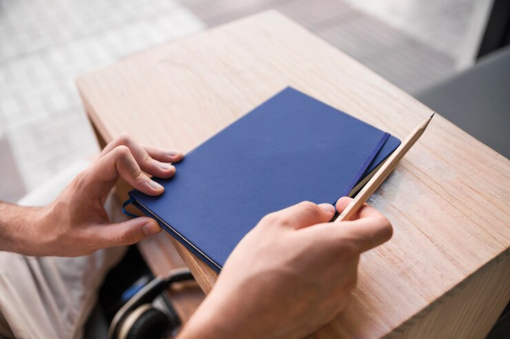 Photo Gratis buku catatan tertutup