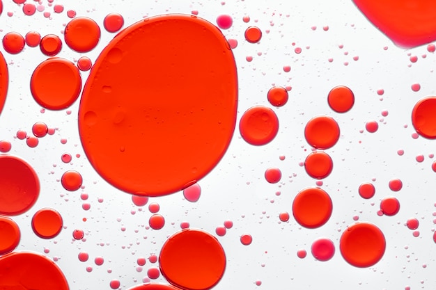 Burbuja de aceite de fondo abstracto rojo en papel tapiz de agua