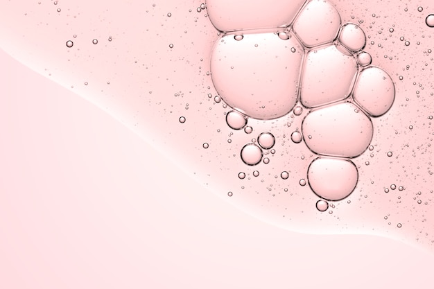Burbuja de aceite de fondo abstracto rosa en papel tapiz de agua