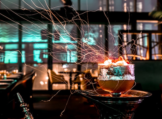 Foto gratuita la cachimba chispea del tazón de cachimba de pomelo