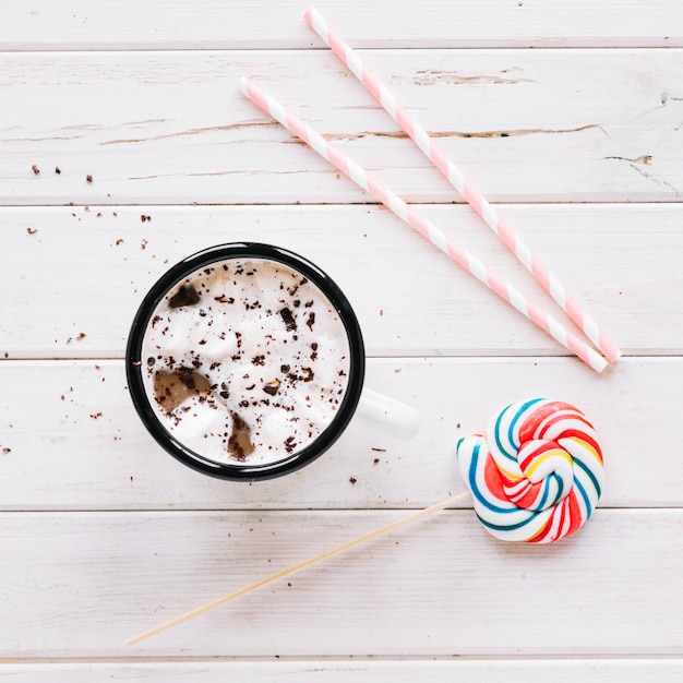 Foto gratuita café al lado de lollipop