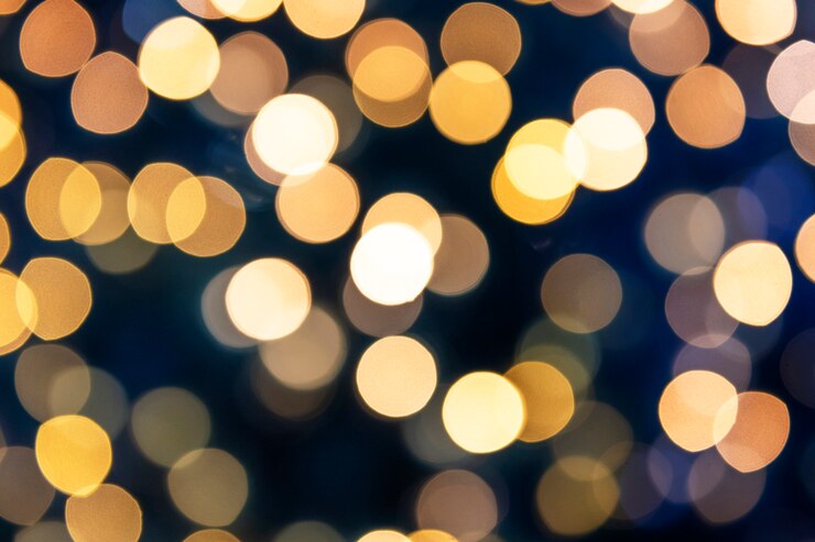 Foto gratuito cálidas luces doradas bokeh