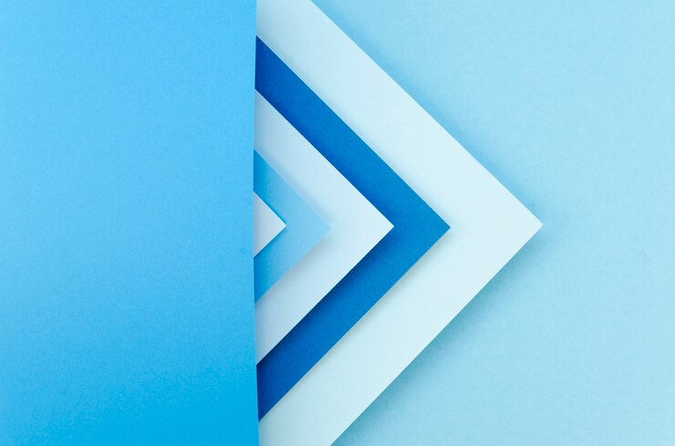 Foto gratuito capa plana de geometría de papel colorido con espacio para copiar