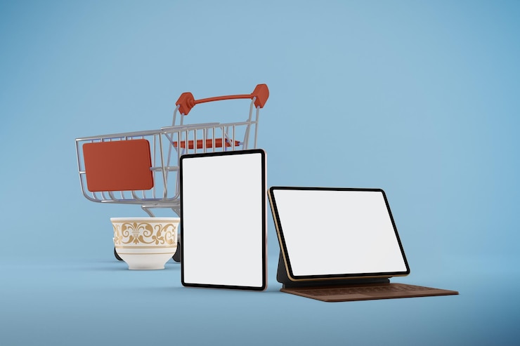 Foto gratuito carrito de compras eid y tableta con parte frontal para computadora portátil