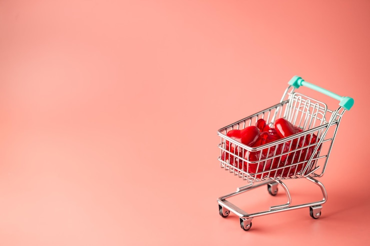 Foto gratuito el carrito de compras lleno de corazones