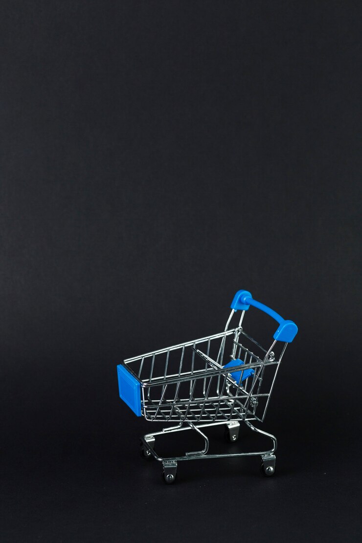 Foto gratuito carro de supermercado de juguete