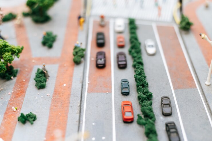 Foto gratuito cerca del modelo de coches pequeños en la carretera, la concepción del tráfico.