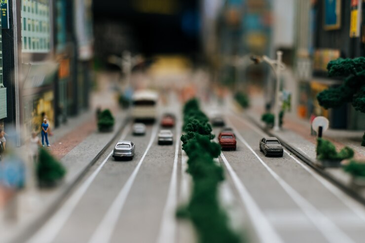 Foto gratuito cerca del modelo de coches pequeños en la carretera, la concepción del tráfico.