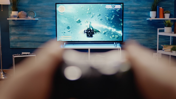 Foto gratuito cerca de la televisión para juegos en la moderna sala de estar en casa