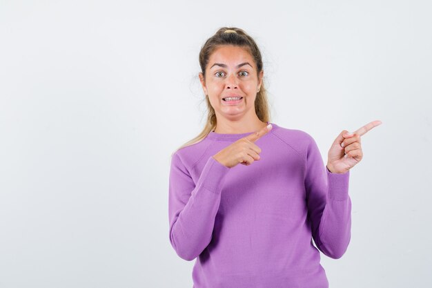 Chica joven expresiva posando en el estudio