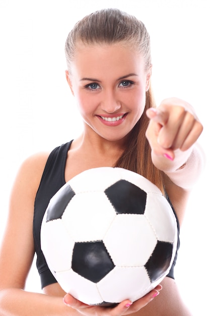 Foto gratuita chica joven y sexy con balón de fútbol