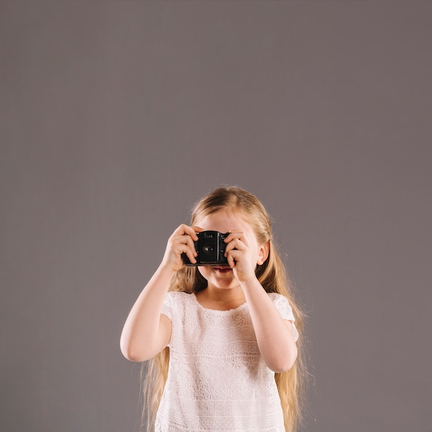 Chica tomando fotos