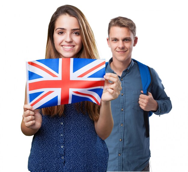 Chico y chica  con una bandera inglesa