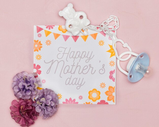 Chupete y flores con tarjeta para dia de las madres