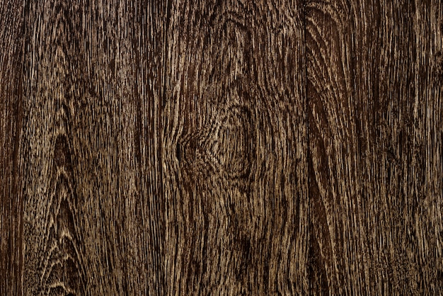 Ciérrese para arriba de un fondo textured suelo de madera marrón