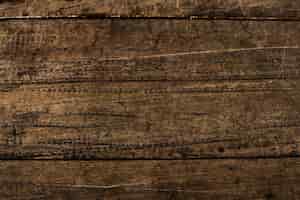 Foto gratuita ciérrese para arriba de un fondo textured suelo de madera marrón