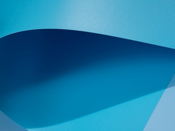 Photo Gratis close-up blue curved sheets of paper