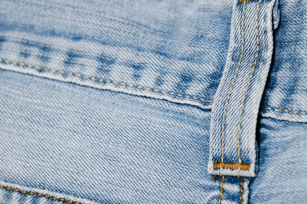 Close-up blue jeans cinturón loop