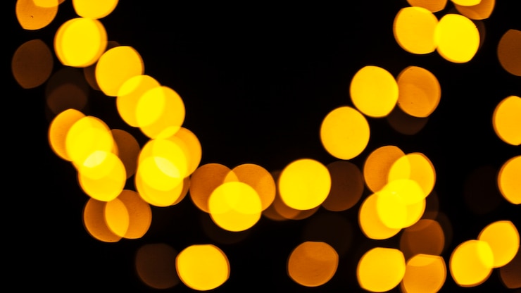 Foto gratuito close-up luces amarillas abstractas
