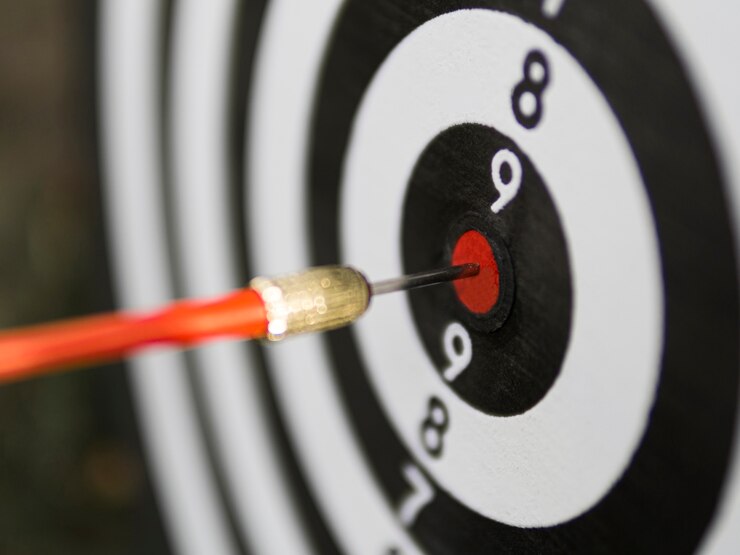 Photo Gratis close-up panah di bull's-eye