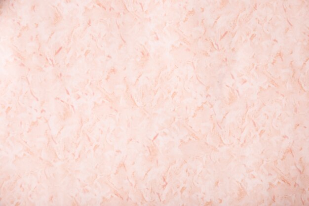 Close-up pared de estuco con textura rosa