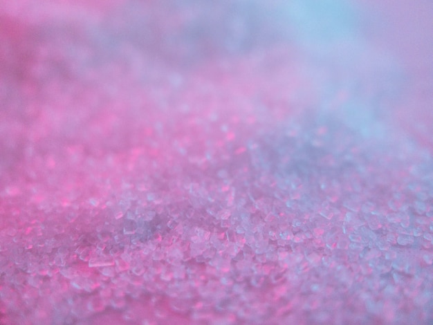 Closeup foto de superficie rosa y azul con destellos