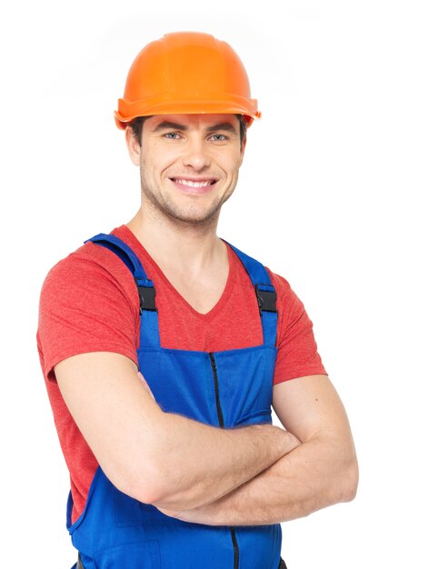 Closeup retrato de trabajador feliz en uniforme aislado en blanco