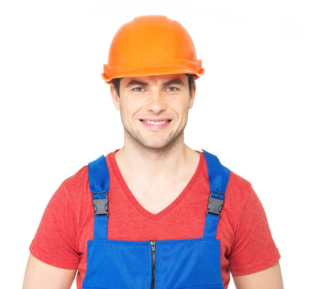 Closeup retrato de trabajador feliz en uniforme aislado sobre fondo blanco.