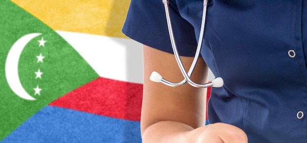 Comoras bandera doctora con estetoscopio, sistema nacional de salud