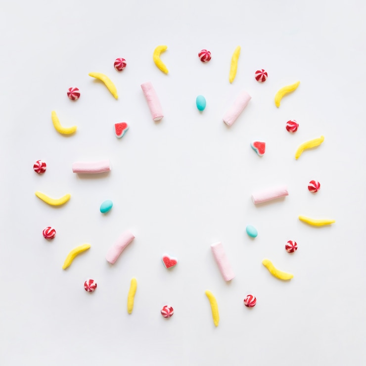 Foto gratuito composición de dulces circulares