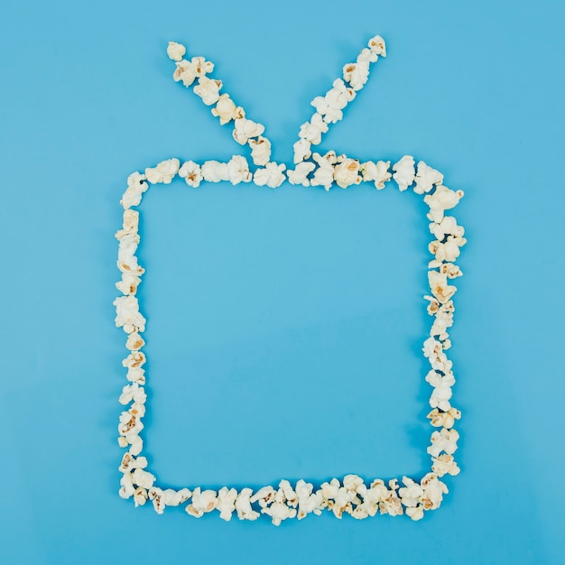 Composición flat lay de palomitas para concepto de cine