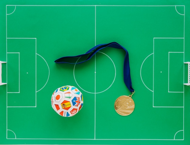 Composición de fútbol con medallas