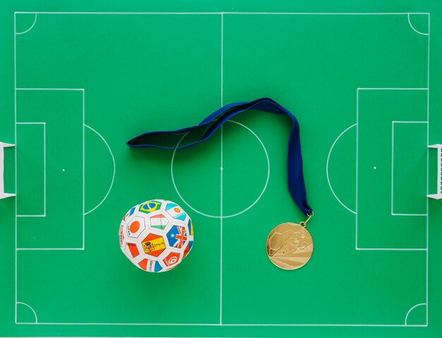 Composición de fútbol con medallas