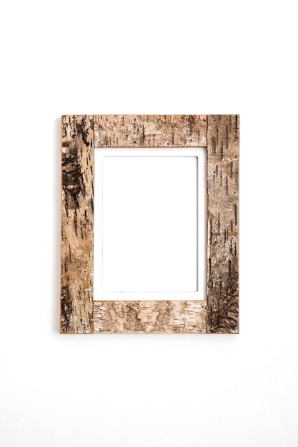 Composición de marco vacío de madera en la pared