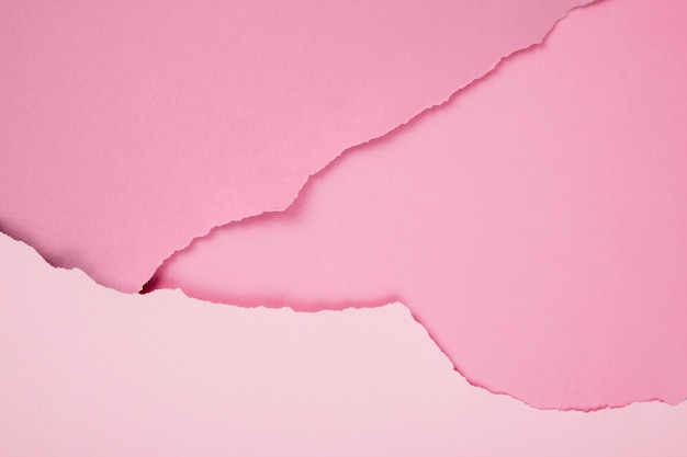 Composición de papeles rosados ​​rasgados