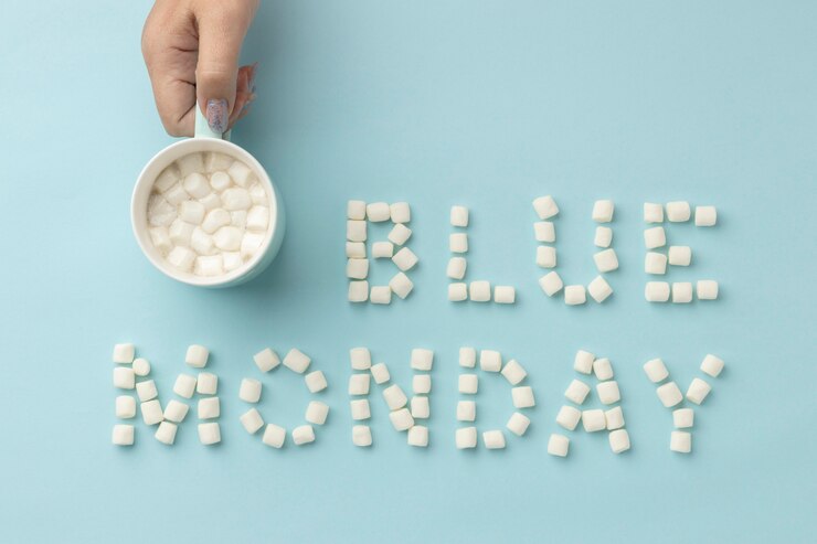 Foto gratuito composición de la vista superior del lunes azul con una taza